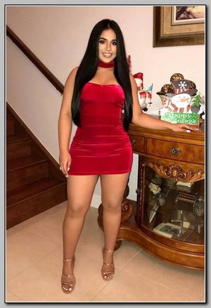 Brunette babe in sexy red dress