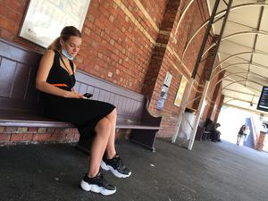 Blonde lass at train station