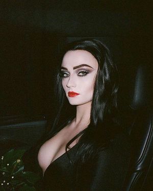 Sophie Turner as Morticia