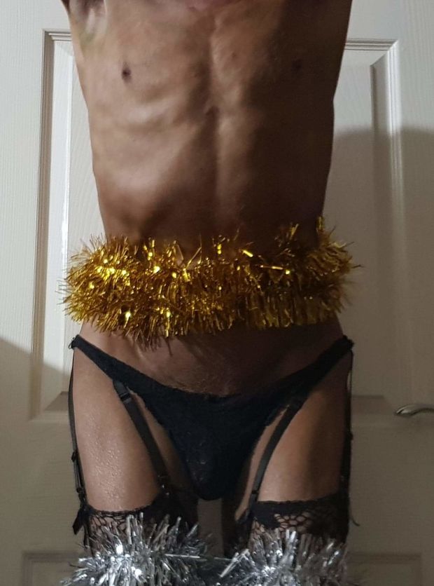 Christmas suspender thong in black with tinsel