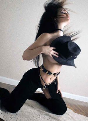 Niece Waidhofer practicing for riding the bull on rodeo night at the club