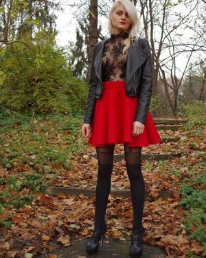 Nasty insta model posing outdoors in see-through blouse and red mini skirt