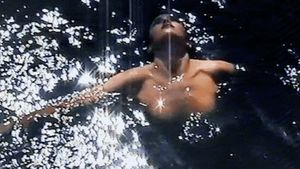 Nude in the pool. Tits out. Excellent!!!