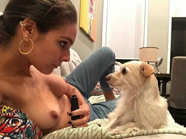 'Australian actress Caitlin Stasey is topless in jeans