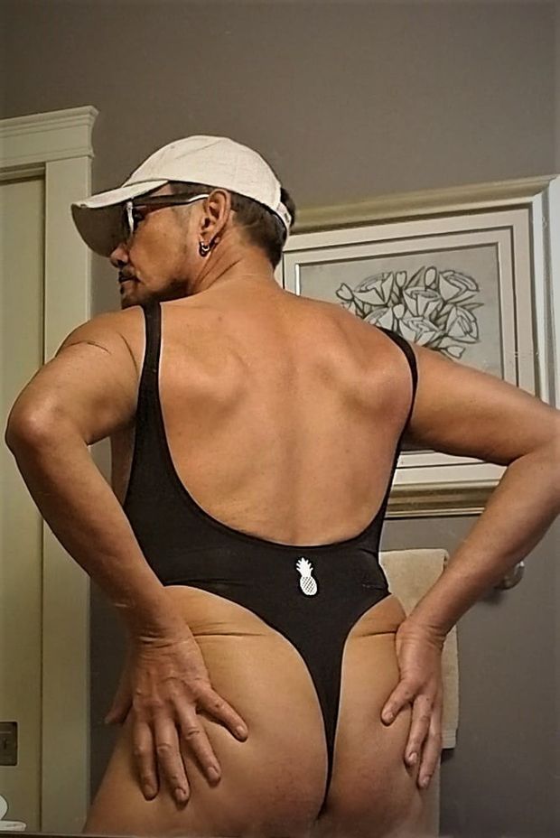 Smooth Submissive Bottom Slut in Black Fucksuit