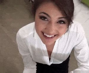 Smiley brunette deepthroats