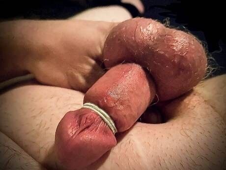 Having some fun with hair ties keeping my cock nice and hard.