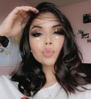 I prefer her low makeup look in bed