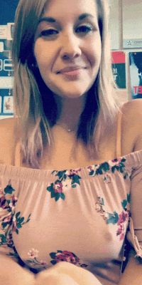 Huge tits behind floral blouse