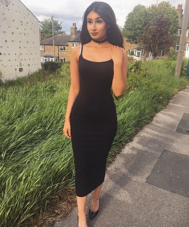 Nice cute chick in long tight black dress