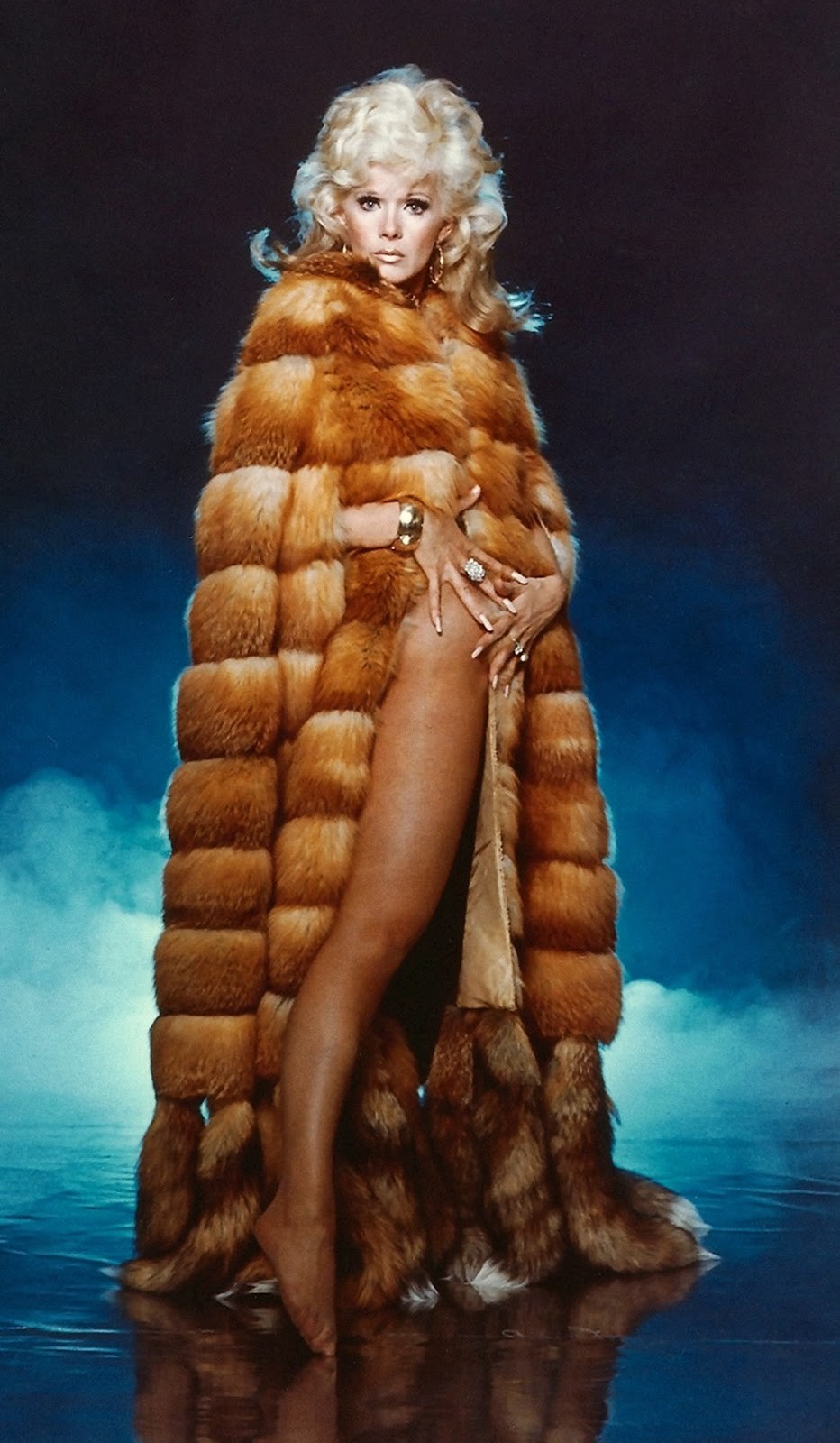Wrapped in fur showing leg