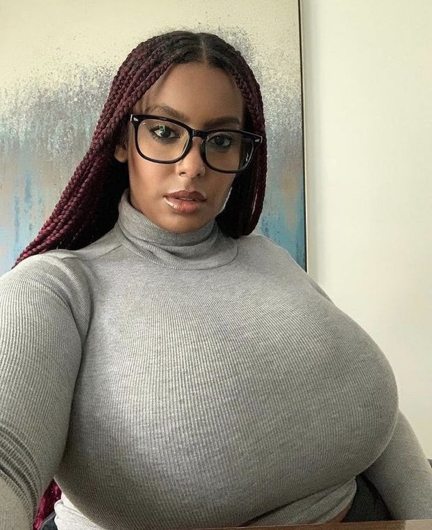 Enormous rack in a gray sweater