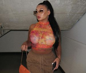 Meghans big tits show through her top