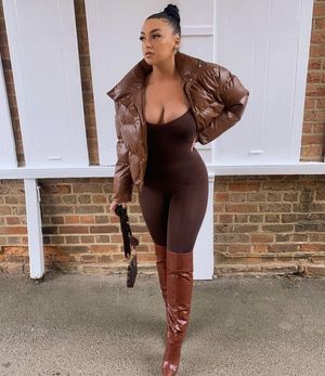 Meghan let’s her tits out with a low cut top