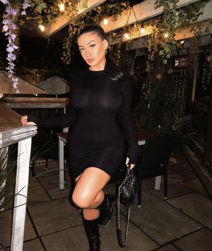 Meghan shows off her big tits to the whole restaurant with a see through tight dress