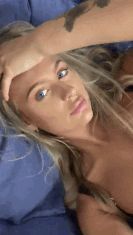 Sexy blonde gets her fingers wet for her pussy