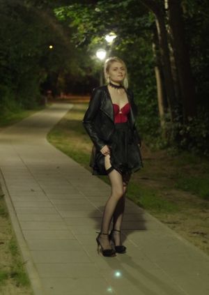Blonde nasty cutie teasing strangers in a park