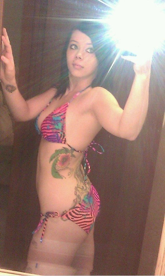 Inked teen self-shot in a bikini