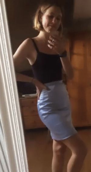 Petite ass in a tight little skirt
