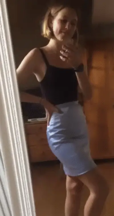 Petite ass in a tight little skirt