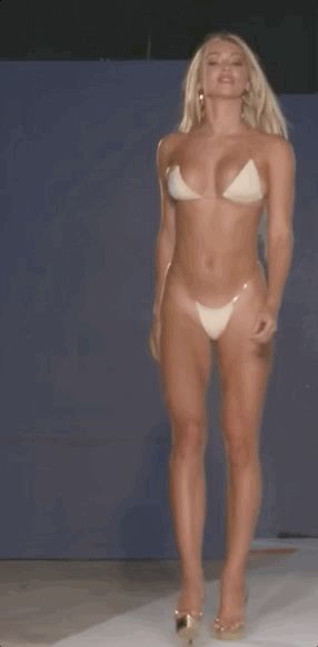 Blonde goddess fashion model on Catwalk