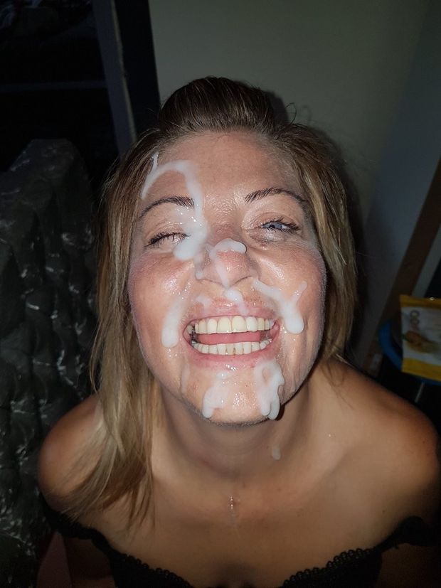 Naughty blonde has her face coated