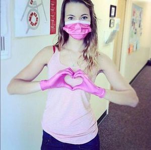 cute nurse with gloves and mask