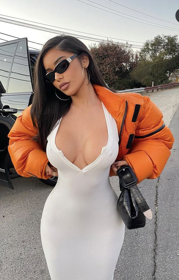 Beauty in tight dress with big breast