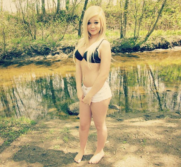 Teen in white jeans shorts