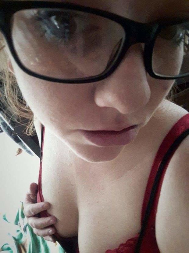 Slutty nerd grabbing tits in bra