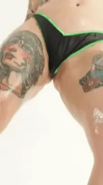 Joanna Angel squeezing her tits together.