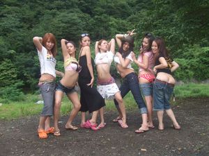 Asian womans flashing underwear in the woods