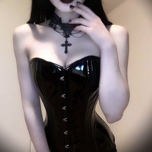 Goth in tight PVC corset