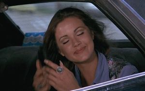 Bobbie Jo and the Outlaw. Minding her own business when someone approaches.