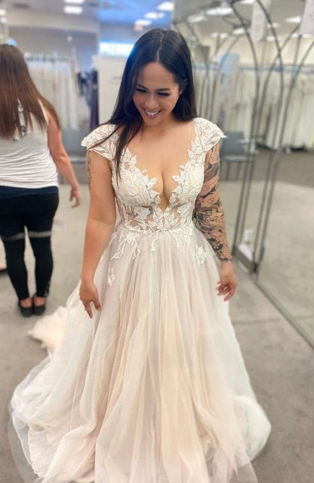 Tattooed wedding dress lady