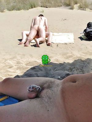 A relaxing day at the beach for this cuck in chastity :)