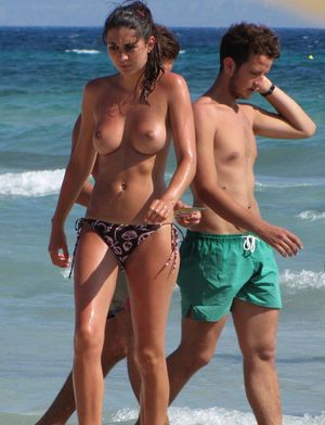 Candid babe at topless beach