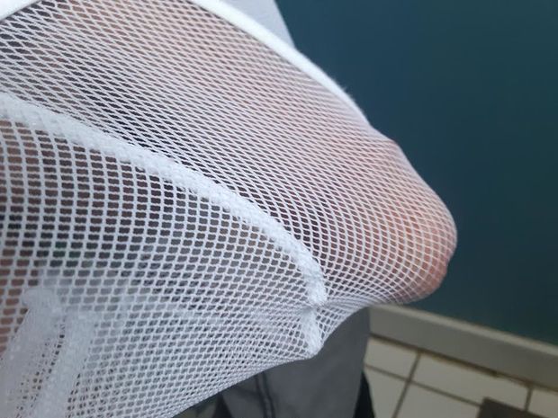 white mesh imprisoned cock straining to be free