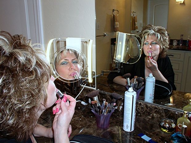 Milf Applies Lipstick
