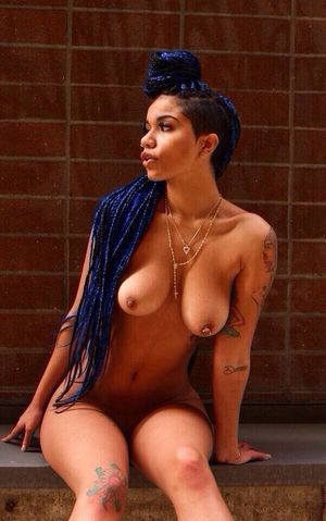 tatted light skin ebony with blue top knot