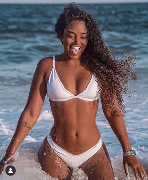 Beautiful ebony queen in the water