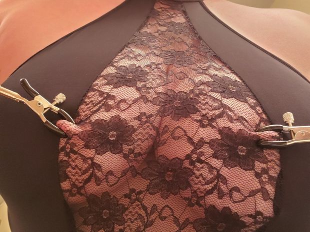 Sexy black lingerie and nipple clamps