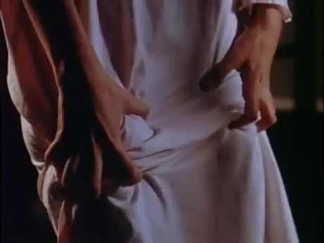 Megan Ward getting groped by her reflection in "Amityville"