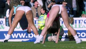 Short shorts wearing cheerleaders with great asses