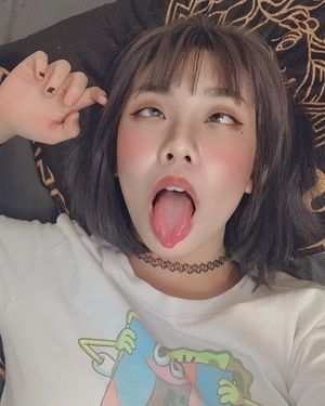 Asian Whore waiting for white seed