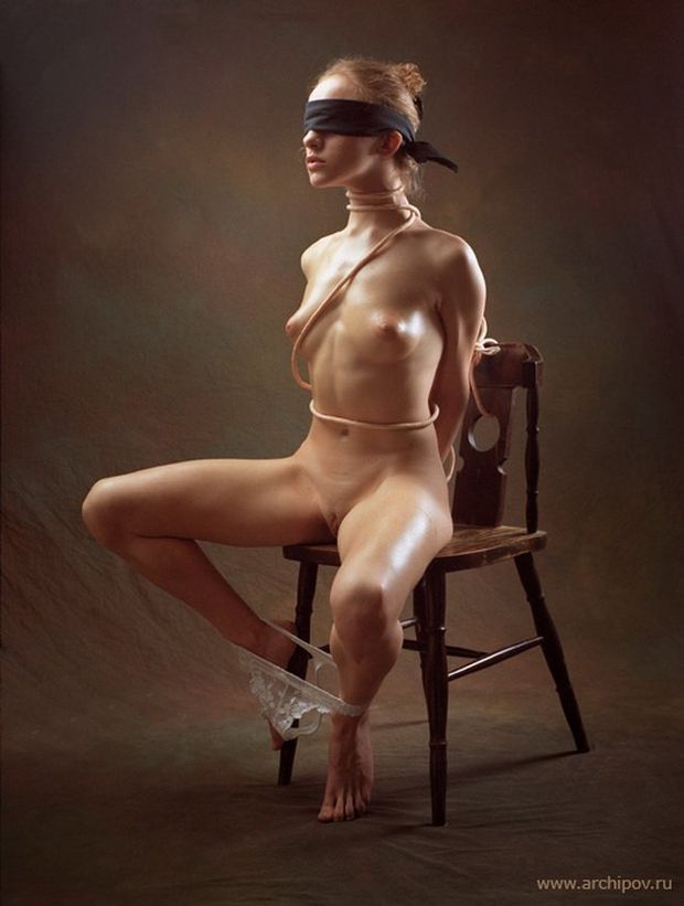 redhead bound on chair