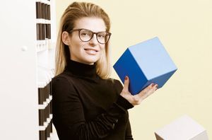 "I have no idea why I am holding this but I hope it makes me look smart."