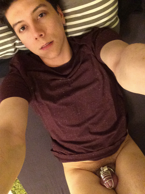 Exposed twink fag in chastity