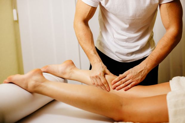 She lets a massage wizard work the magic of his fingers on her.