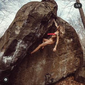 Nude athlete oudoor climbing